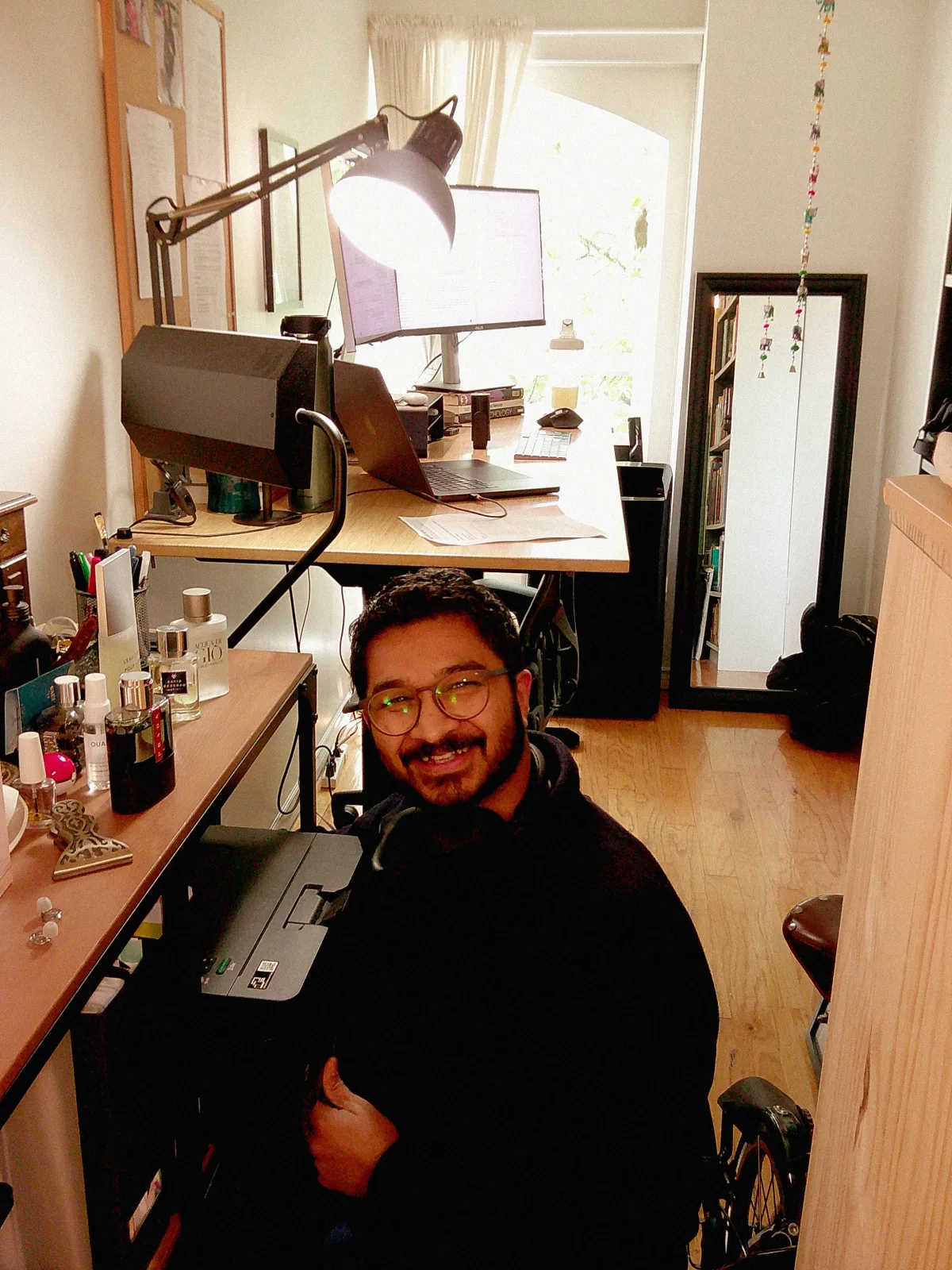 David Manuel seated in his workspace